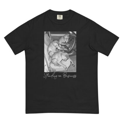 standin on business t-shirt with monkeys in car