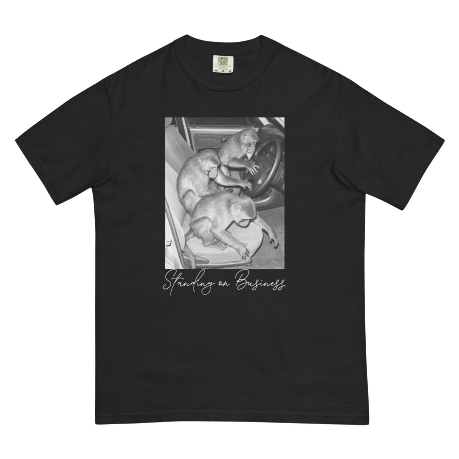 standin on business t-shirt with monkeys in car